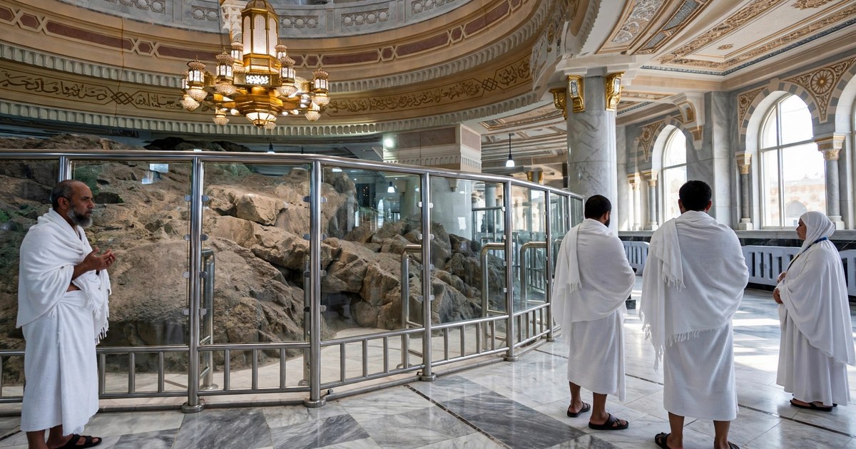 The rocks of the hill of Safa enclosed behind glass inside Masjid al-Haram